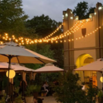 Outdoor patio dining with string lights at the Pearl District in San Antonio