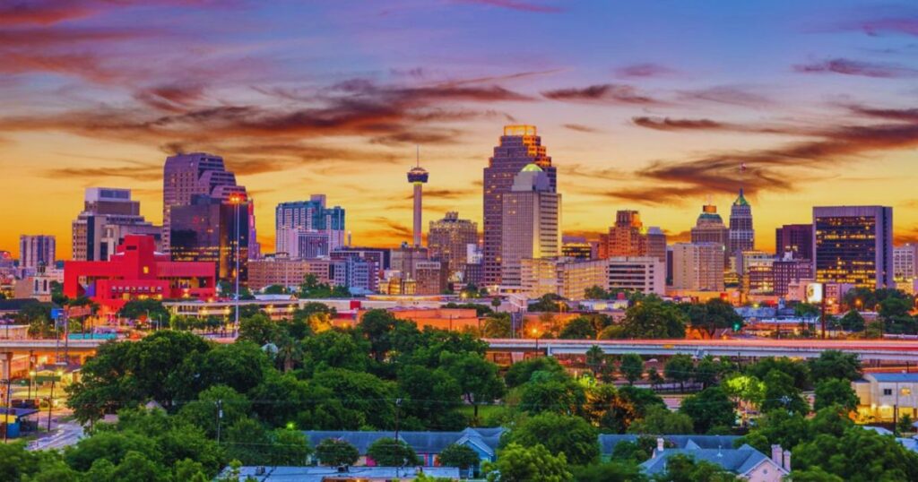 San Antonio skyline and River Walk at sunset
