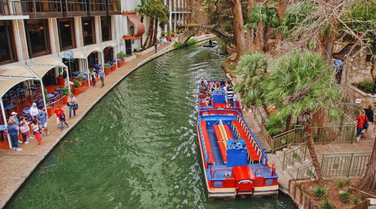 San Antonio River Walk with boats and restaurants along the water