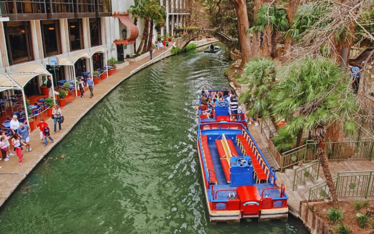 San Antonio River Walk with boats and restaurants along the water