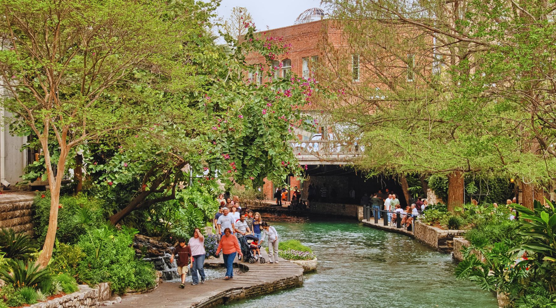 Visitors exploring San Antonio River Walk activities